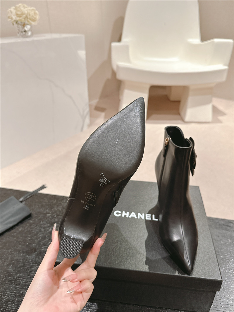 Ch**el heel black calfskin pointed toe boots