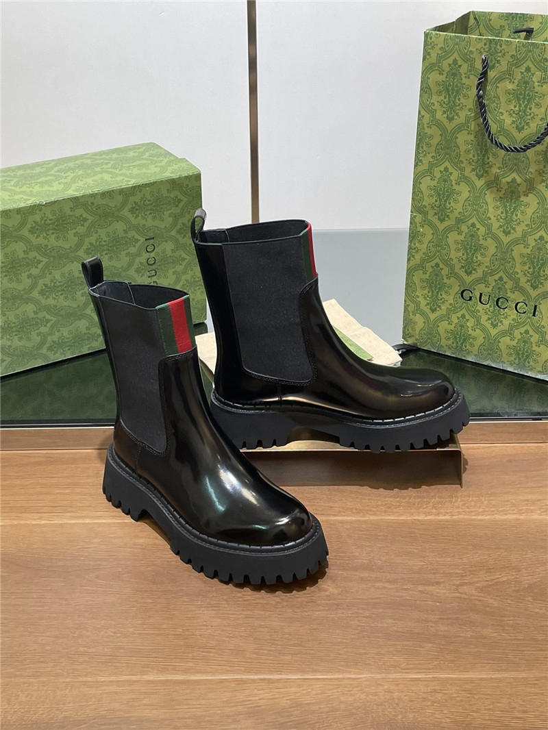 Gvc*1 women’s black patent leather boot with web