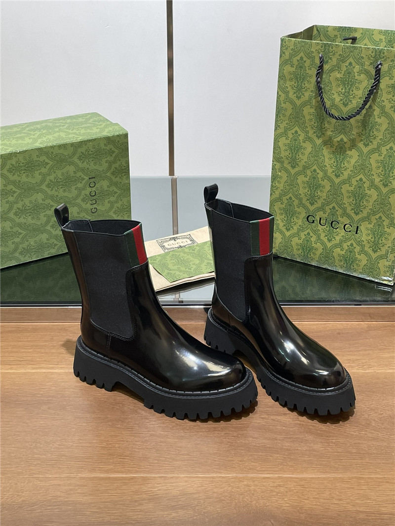 Gvc*1 women’s black patent leather boot with web