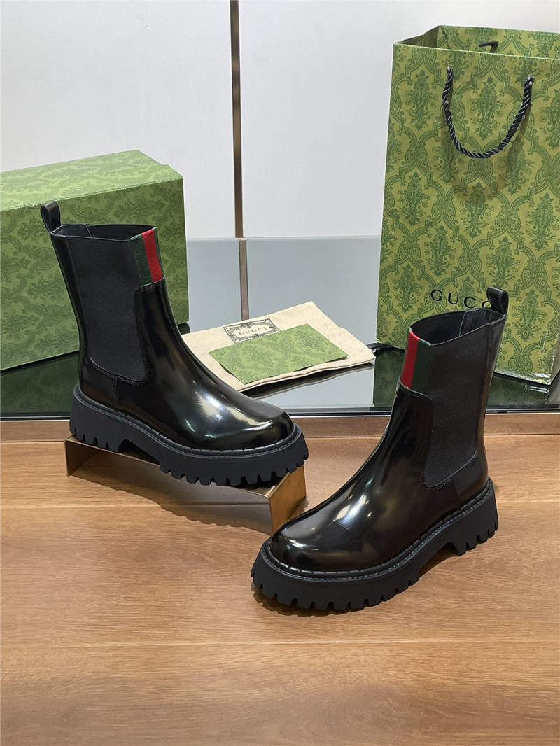 Gvc*1 women’s black patent leather boot with web