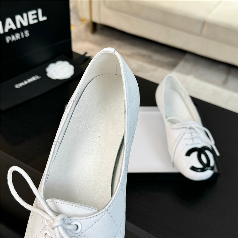 Ch**el lace-up white leather flats