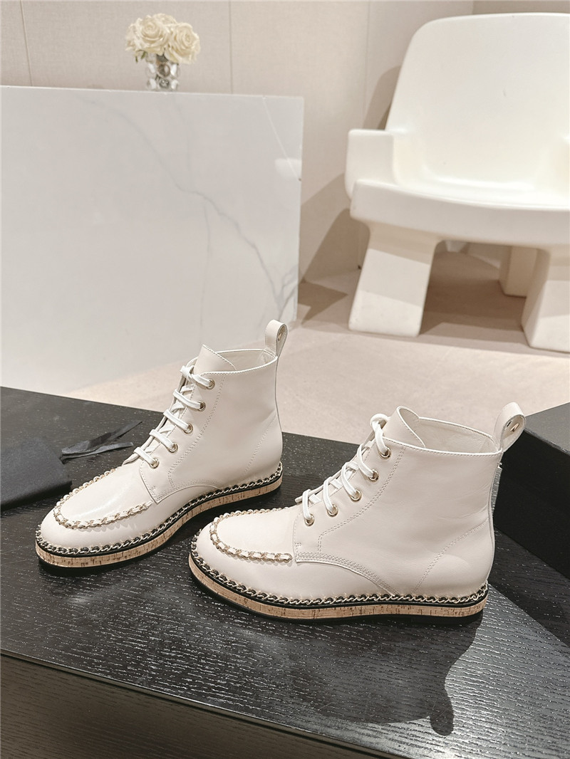 Ch**el lace-up calfskin flat ankle boots in white
