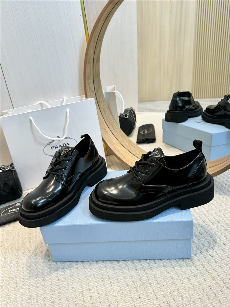 Pra*a leather triangle logo loafers