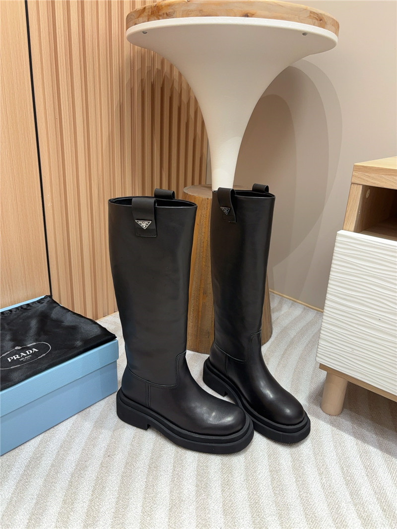 Pra*a women logo plaque leather boots in black