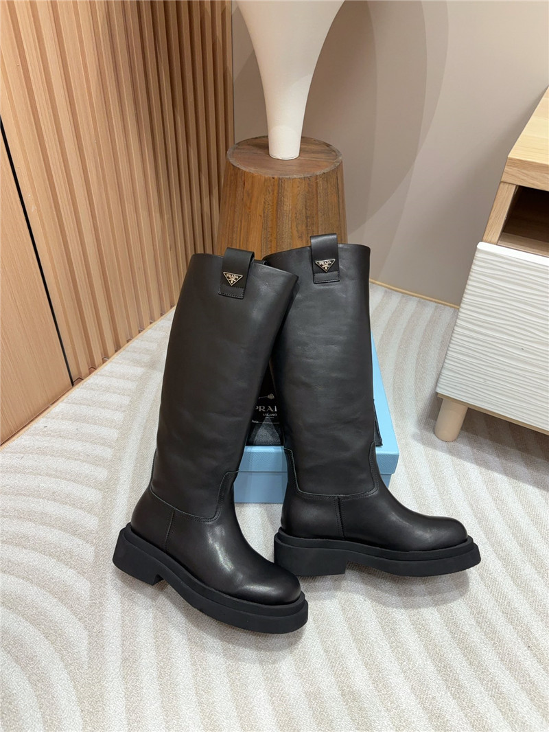 Pra*a women logo plaque leather boots in black