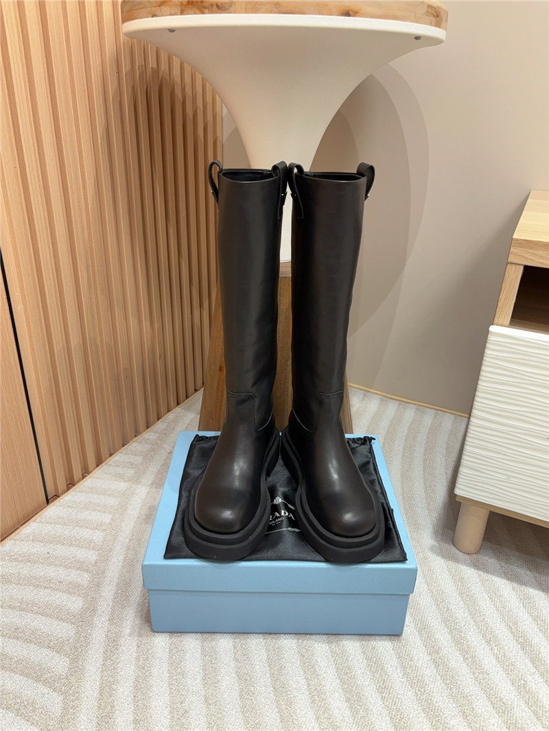 Pra*a women logo plaque leather boots in black