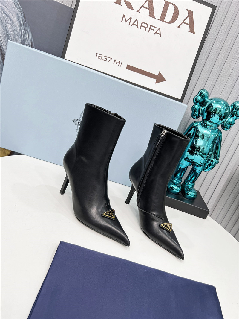 Pra*a black calfskin heeled ankle boots