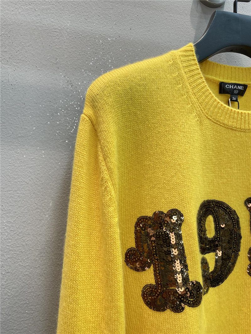 Ch**el sequin embroidered wool sweater in yellow