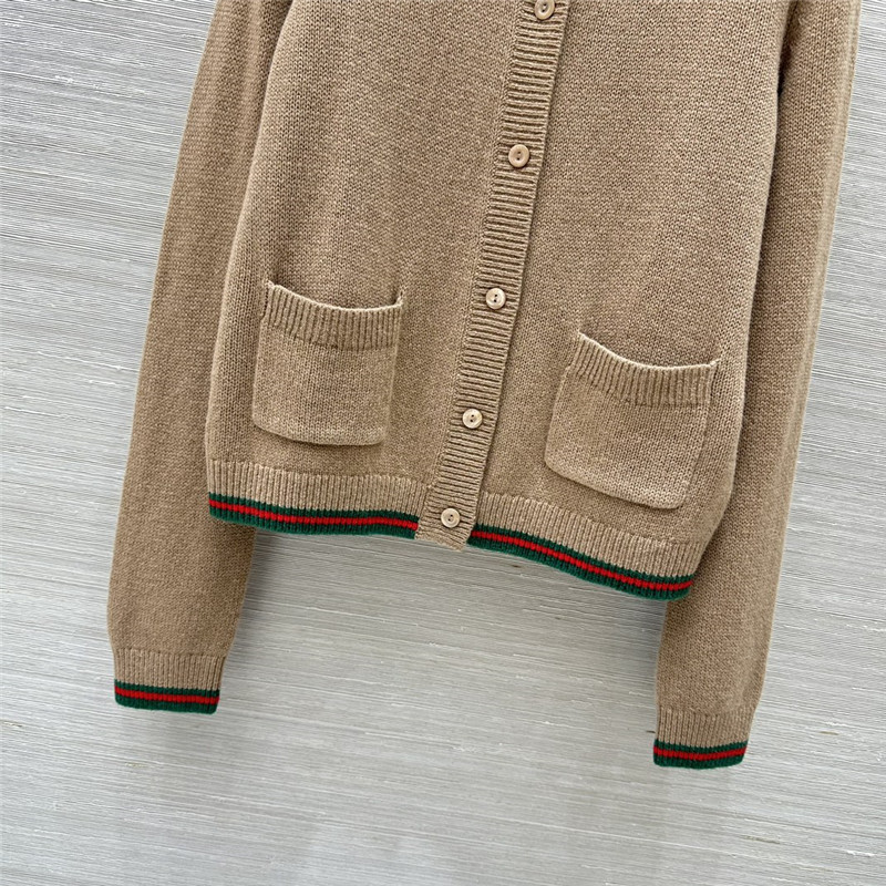 Gvc*1 beige cardigan with web finishes