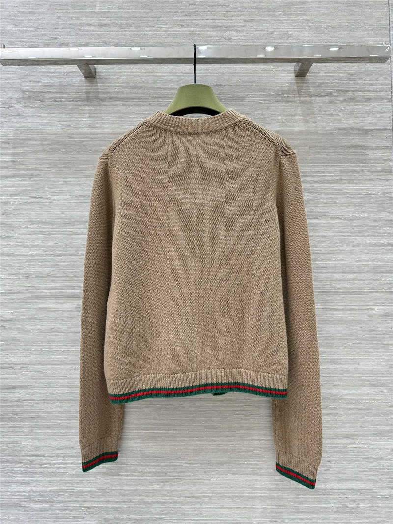 Gvc*1 beige cardigan with web finishes