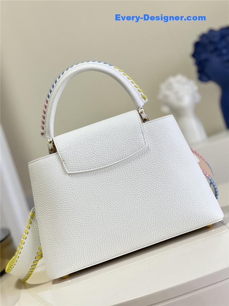 l0vis Vvtt0n lv capucines mm taurillon leather bag