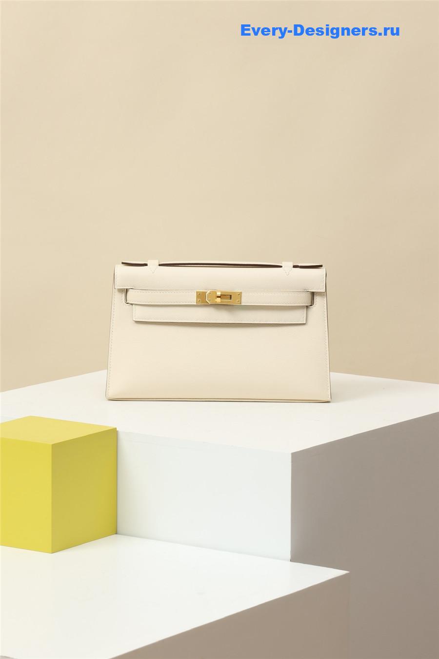 H**me5 kelly pochette swift leather bag beige