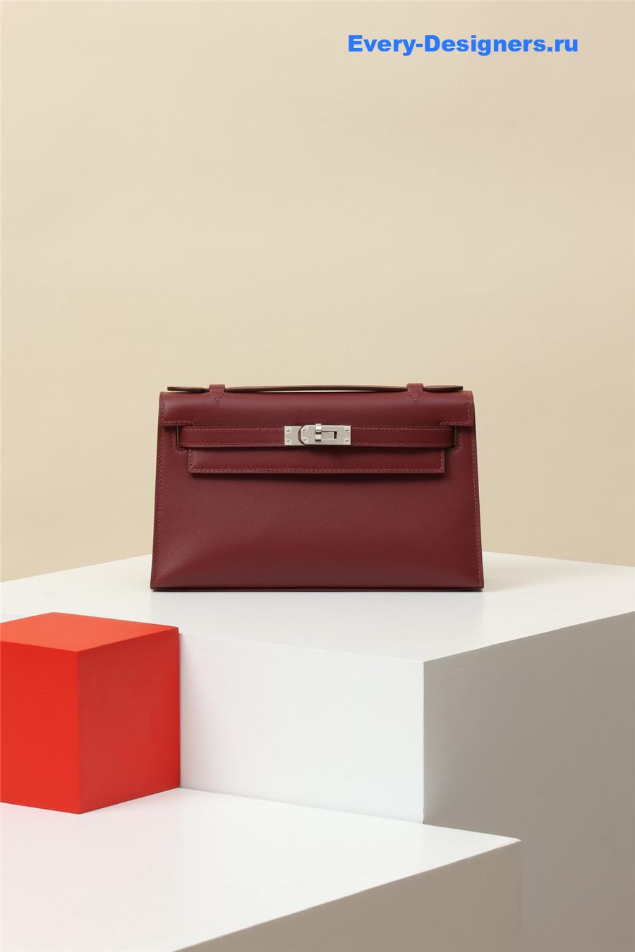 H**me5 kelly pochette swift leather bag red