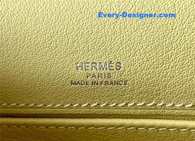 H**me5 kelly pochette swift leather bag