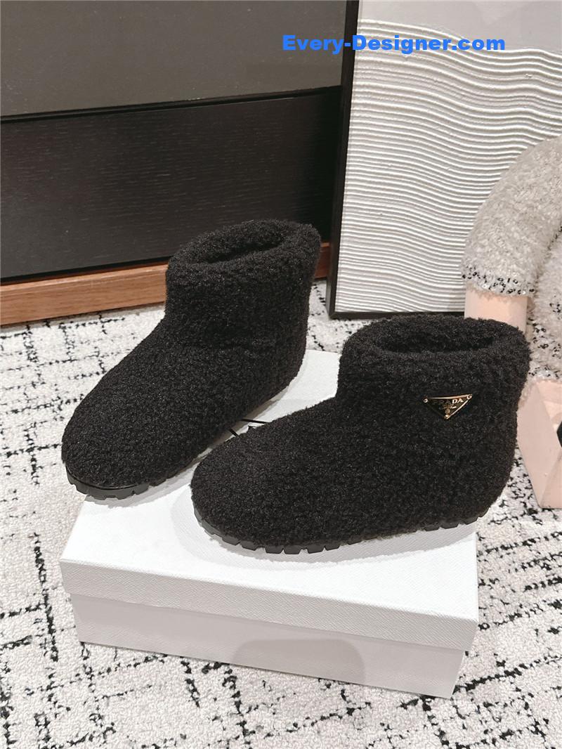 Pra*a black shearling booties
