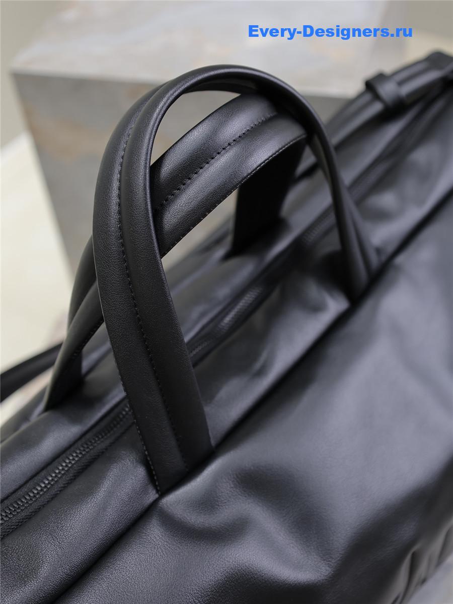 Sa1nt Lau*nt logo-debossed leather weekend bag black