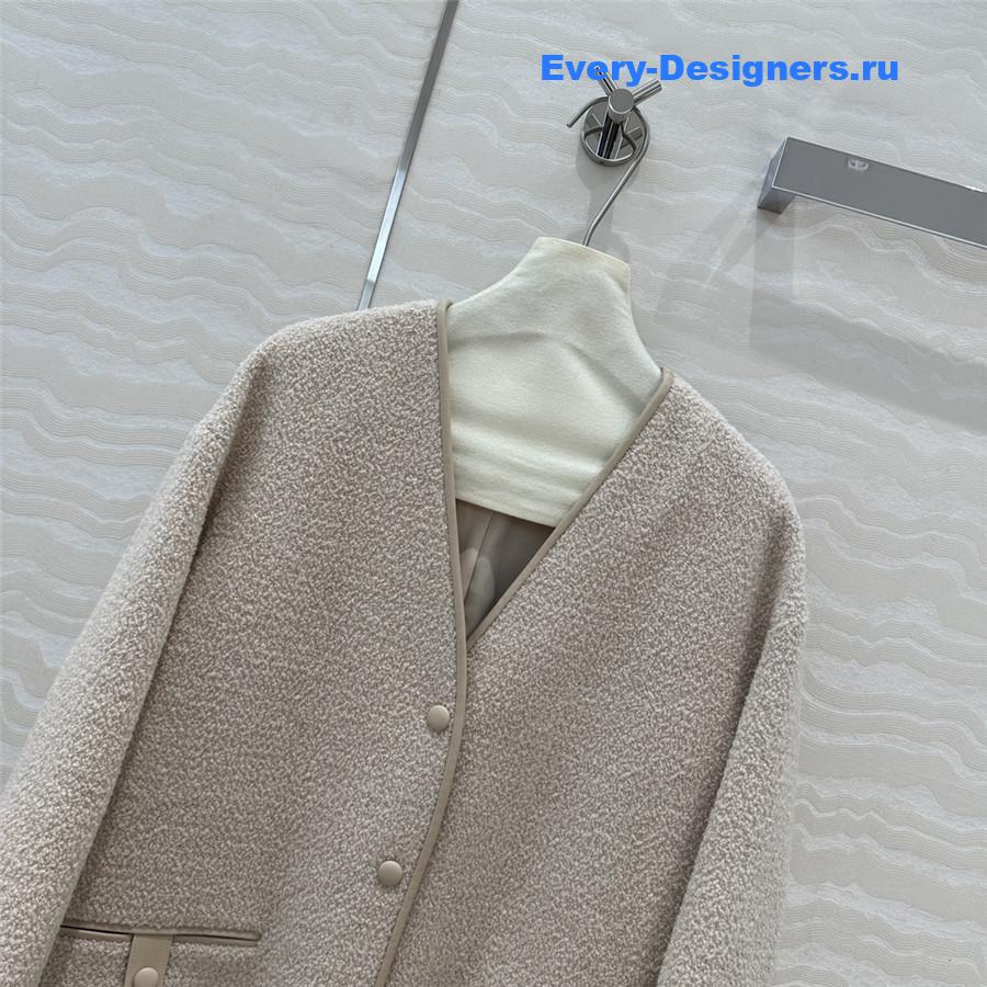 Pra*a woolen sheepskin trim coat