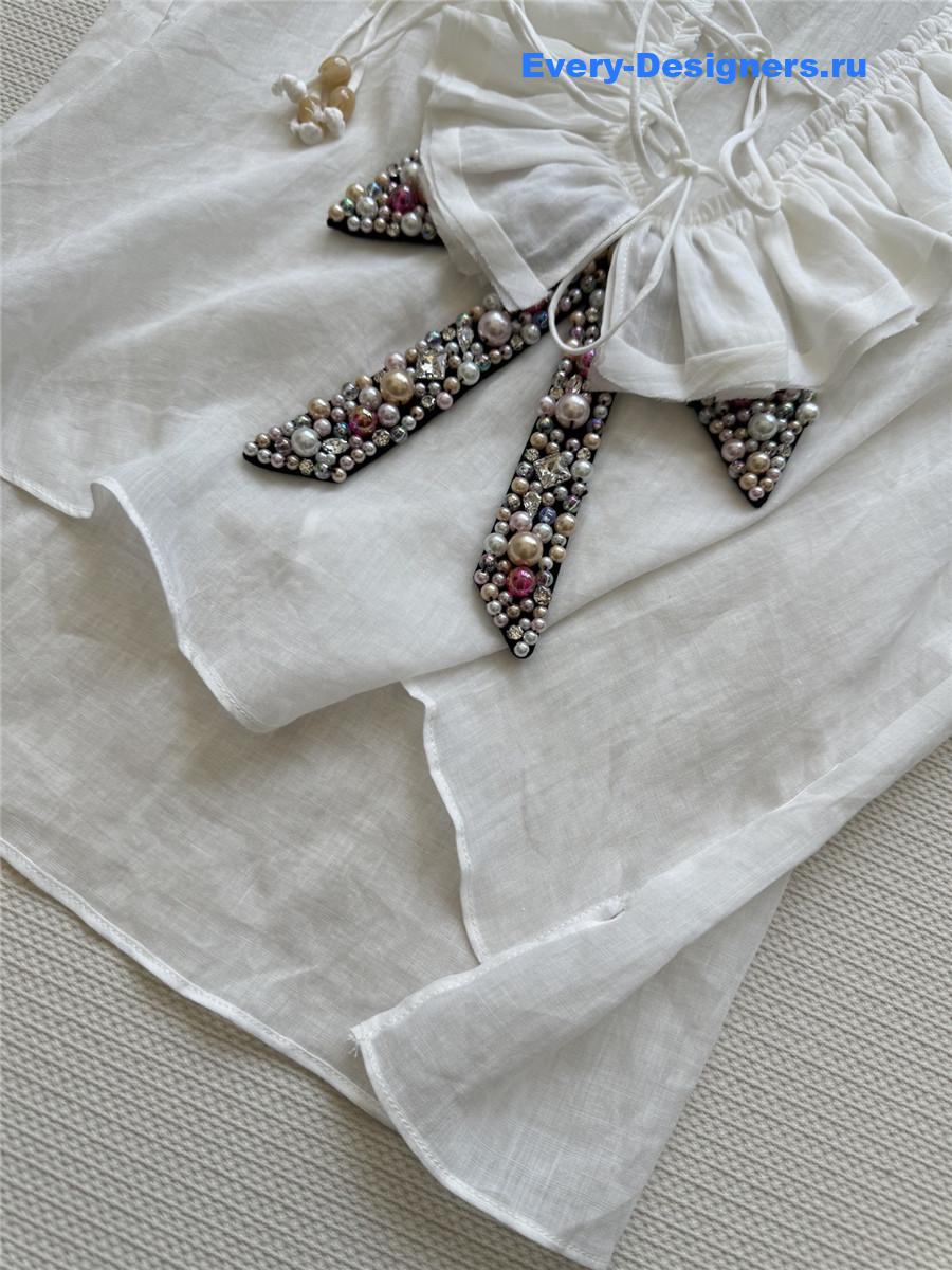 Ch**el beaded bow v-neck top