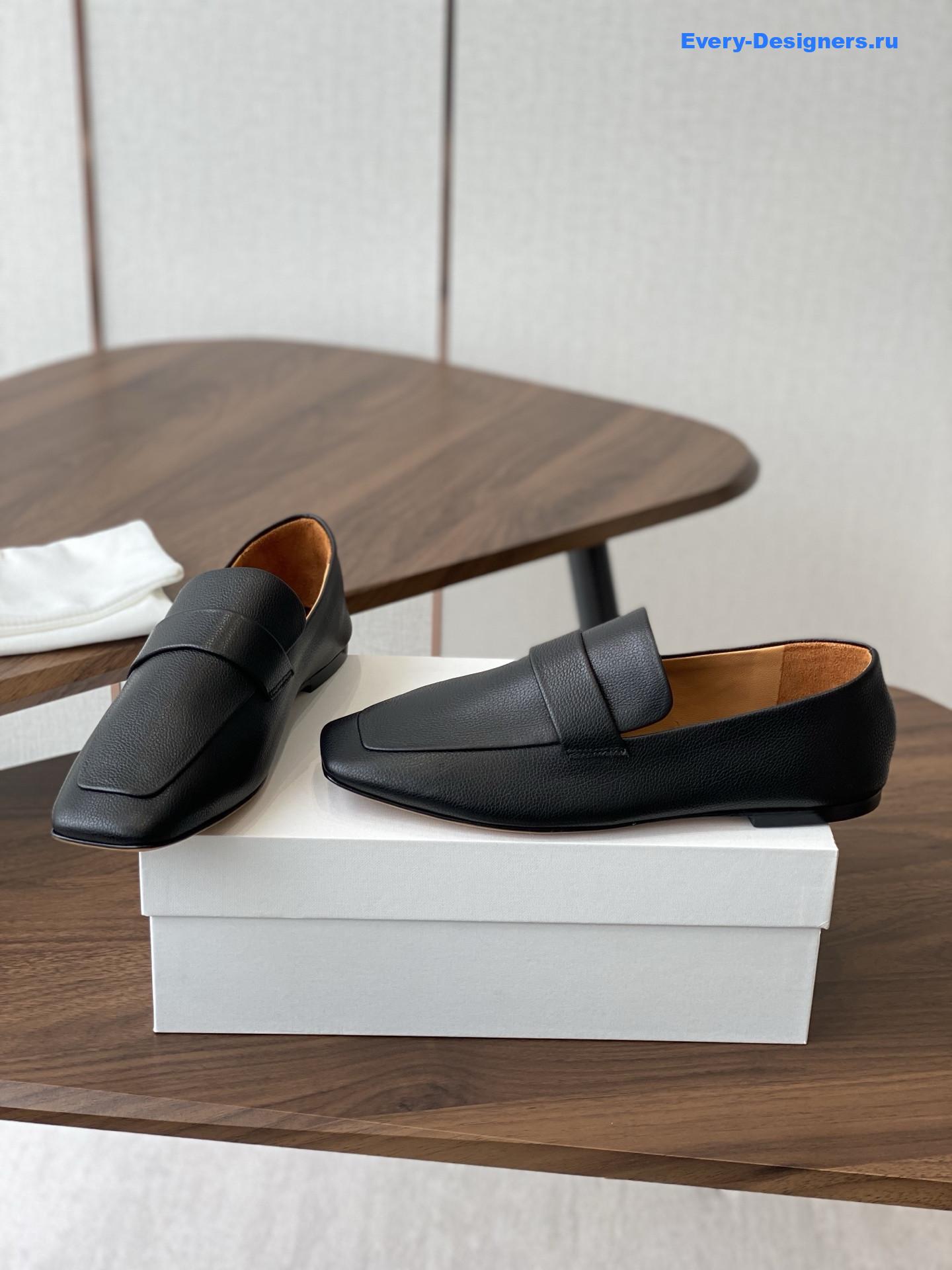 The R0w black square leather loafers