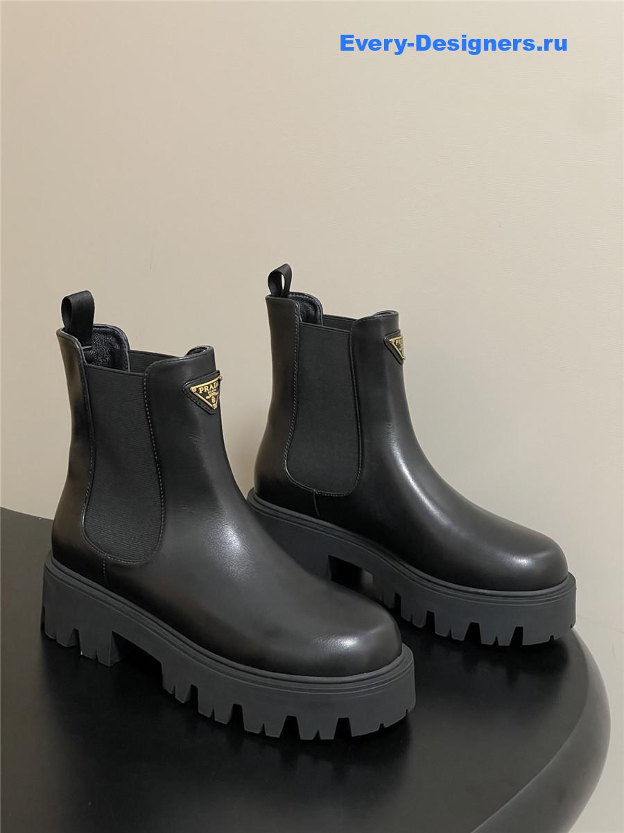 Pra*a black monolith brushed leather booties